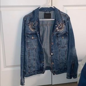Denim coat with zipper embellishments and patches